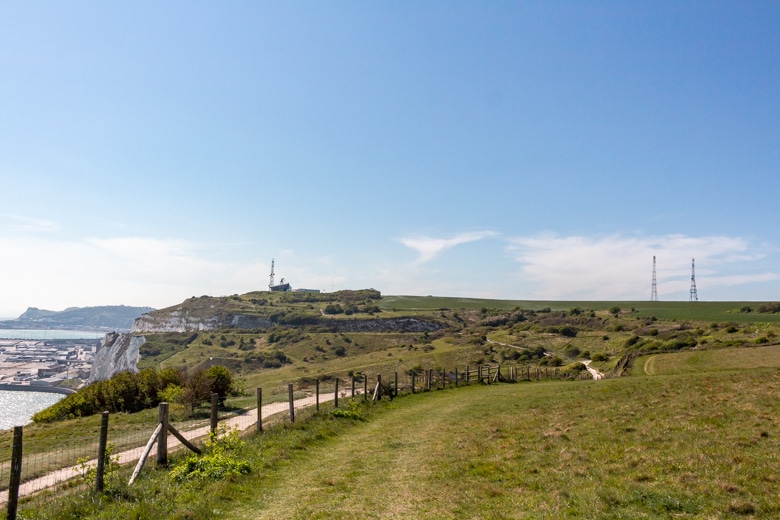 View of a fenced area we walked through with a Port of Dover in the background - walk from Dover to Deal