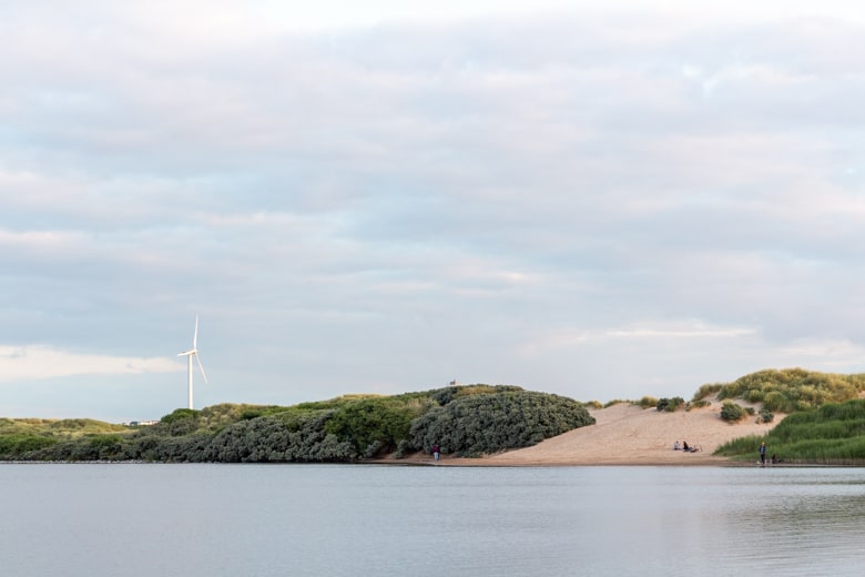 Crosby Beach, the nearest beach to Liverpool - view of the san dunes and wind turbine in Crosby Marine Park, Marine Lake